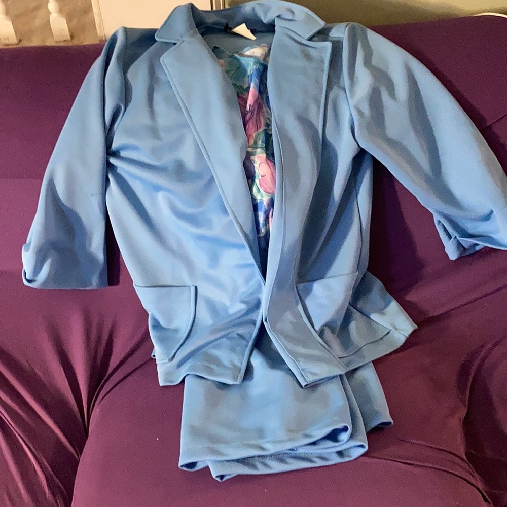 Women’s blazer with matching blouse and skirt